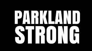 Bold white text saying ‘PARKLAND STRONG’ on a black background.
