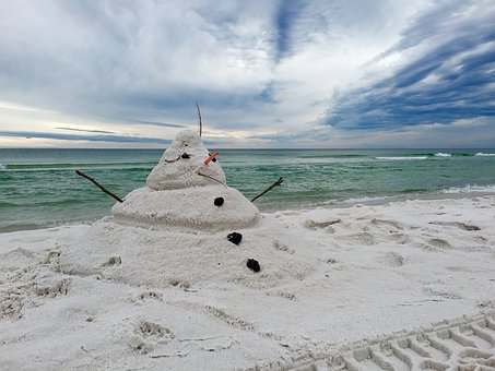 snowman-on-beach-1927360__340