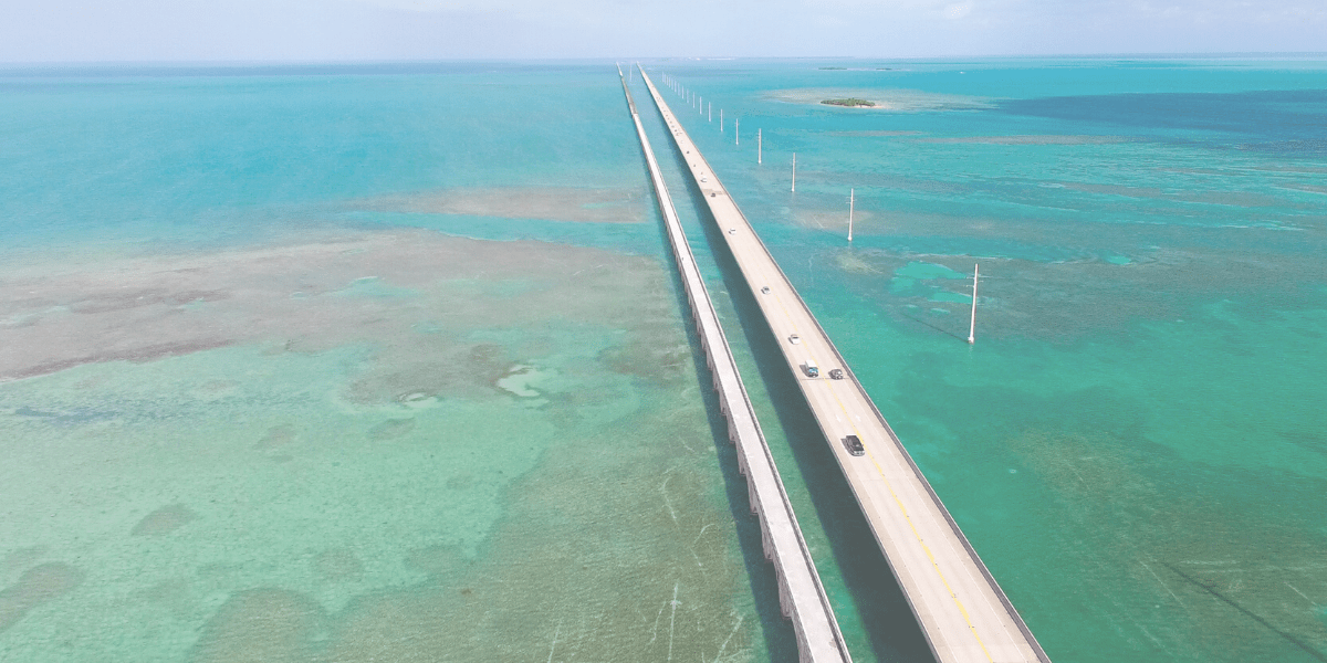 aerial view of a bridge over the sea